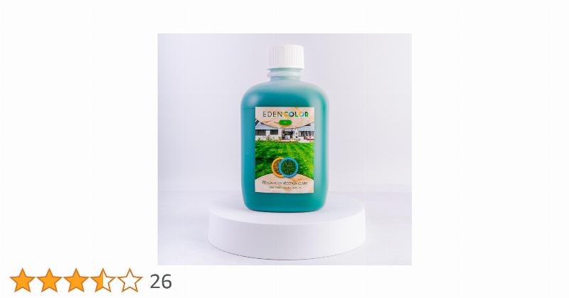 Application de la peinture pour gazon avec un pulvérisateur dans un jardin résidentiel