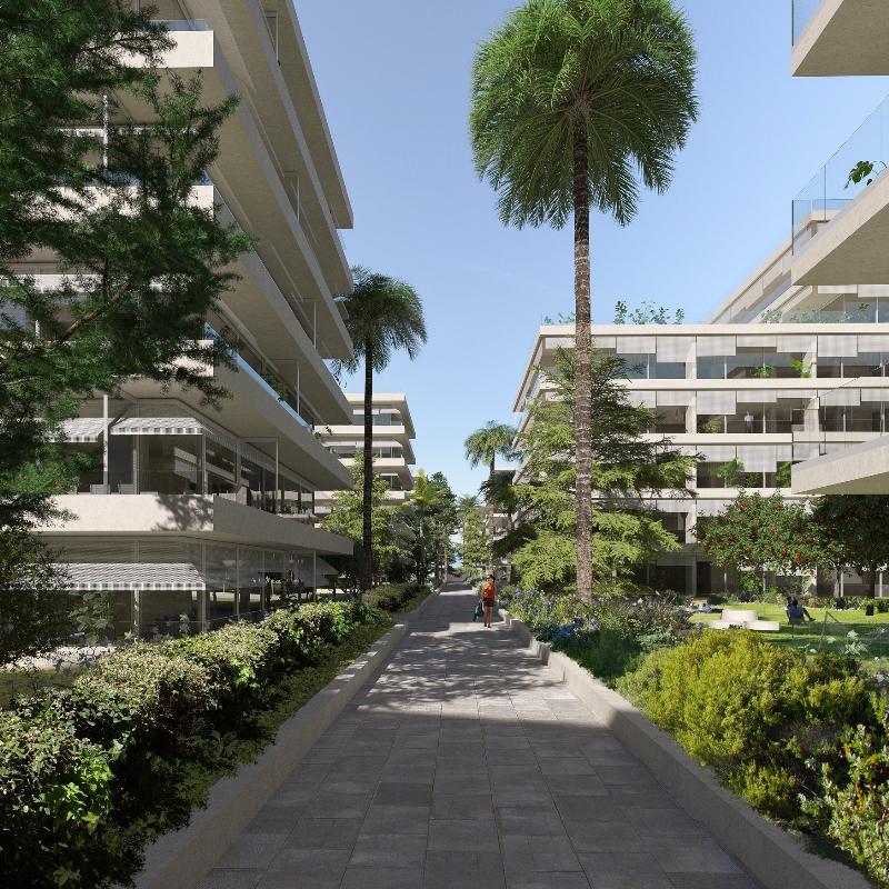 Vue aérienne d'une ville moderne avec des bâtiments durables et des espaces verts.