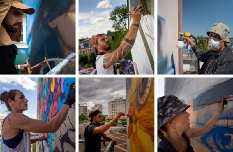 Artiste de rue peignant une fresque colorée sur un mur de bâtiment à Paris, style impressionniste