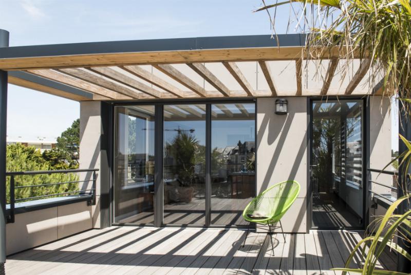 Façade d'une maison française parfaitement harmonisée avec son environnement