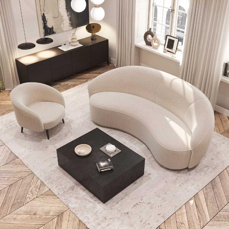 Un intérieur d'architecture moderne baigné de lumière naturelle, avec des lignes épurées et un mobilier minimaliste