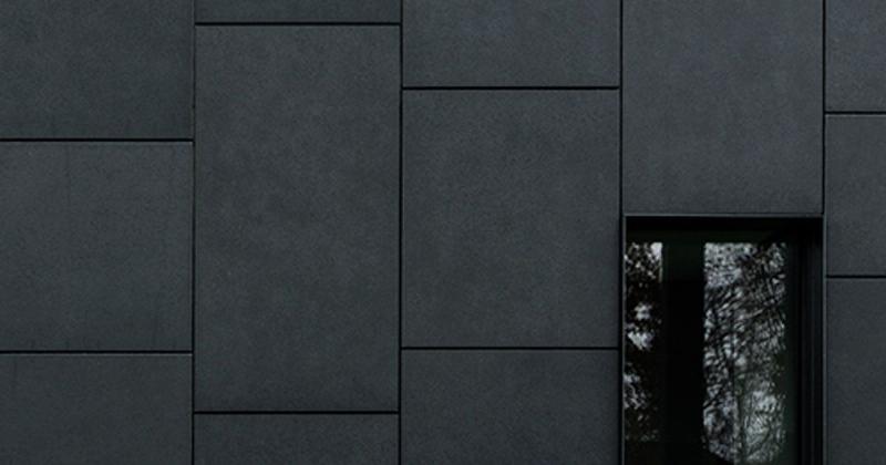 Exemple de façade moderne avec béton et verre en France