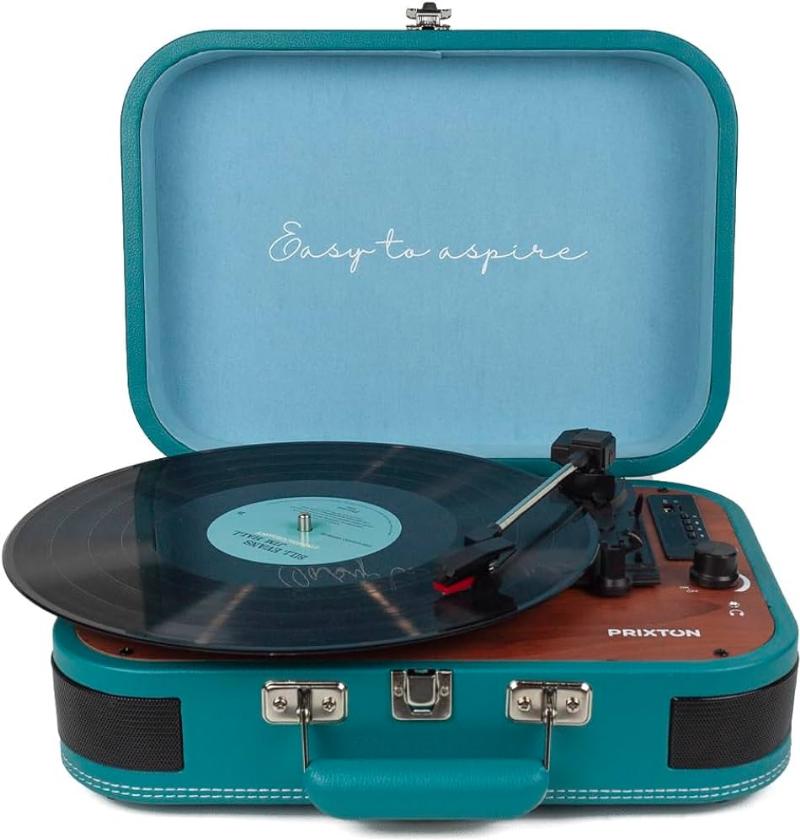 Collection de vinyles de musique 70 80 française sur une platine vintage