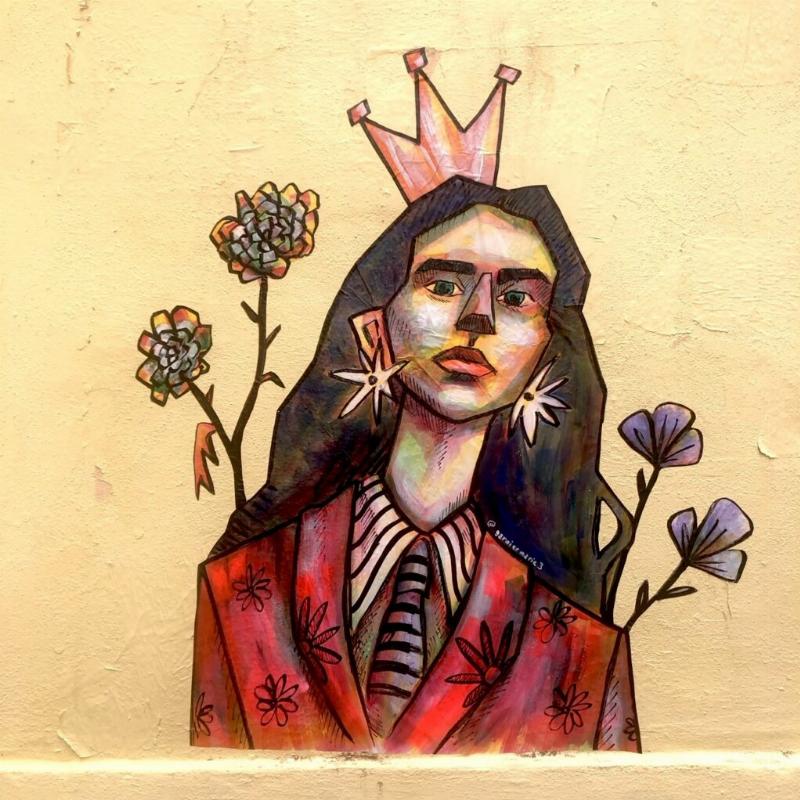 Visiter une galerie street art à Lyon à la Croix-Rousse avec des fresques murales colorées et des graffitis