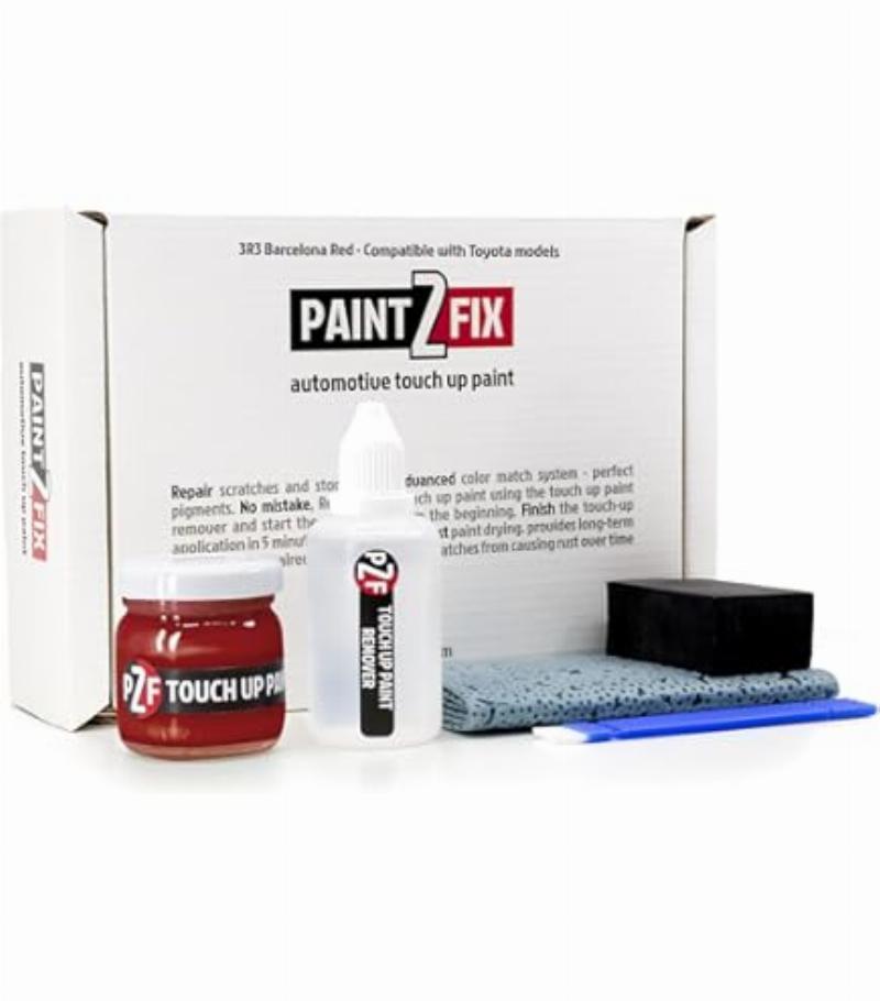 Primer application of a touch-up product on a small chip on a black powder-coated garden table leg.