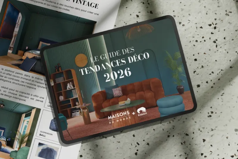 Idée de décoration murale avec peinture effet rouille fer dans un salon moderne, style industriel chic français.