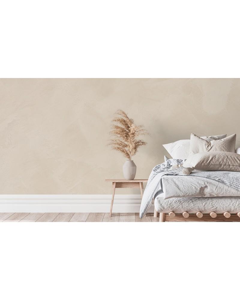 Peinture de terrasse en béton couleur pierre naturelle, finition mate, avec des meubles de jardin en rotin.