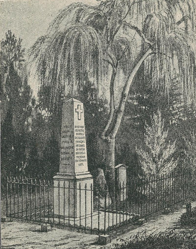 Alt text: Peinture détaillée sur une tombe française, avec des motifs floraux et un symbole patriotique