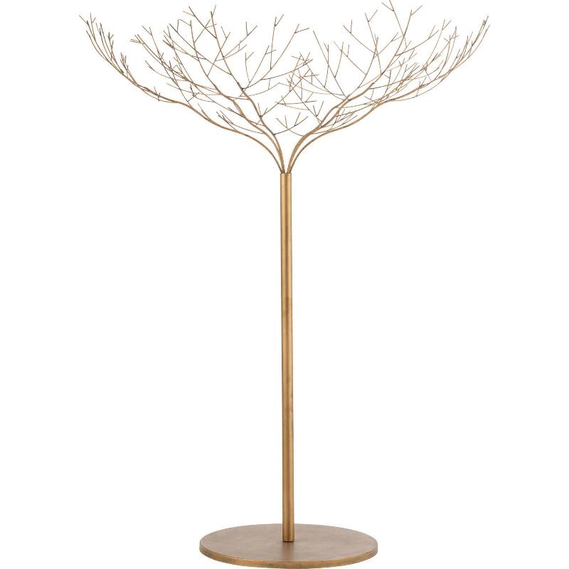 Statue de singe au design moderne, épurée et stylisée, posée sur une table basse dans un salon contemporain.