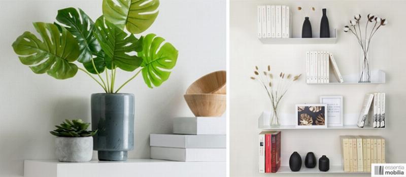 Composition de plusieurs statuettes animales, mélangeant bois et métal, sur une étagère murale dans un salon bohème.